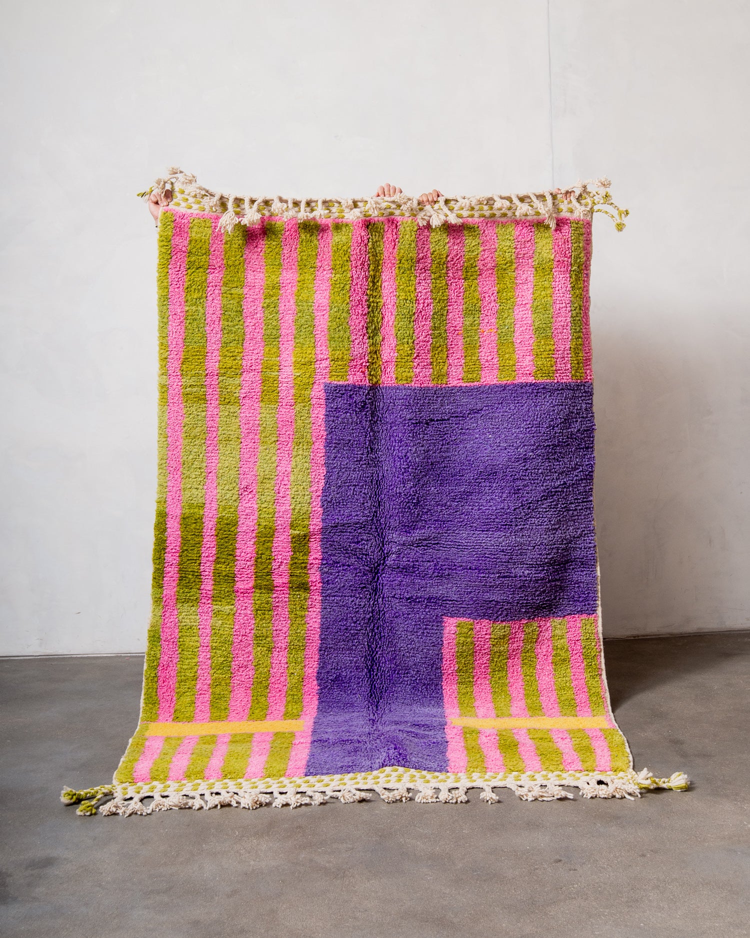 Modern, designer, handcrafted Berber rug from Morocco. Beniourain carpet with beautiful colours and patterns and fluffy wool texture.